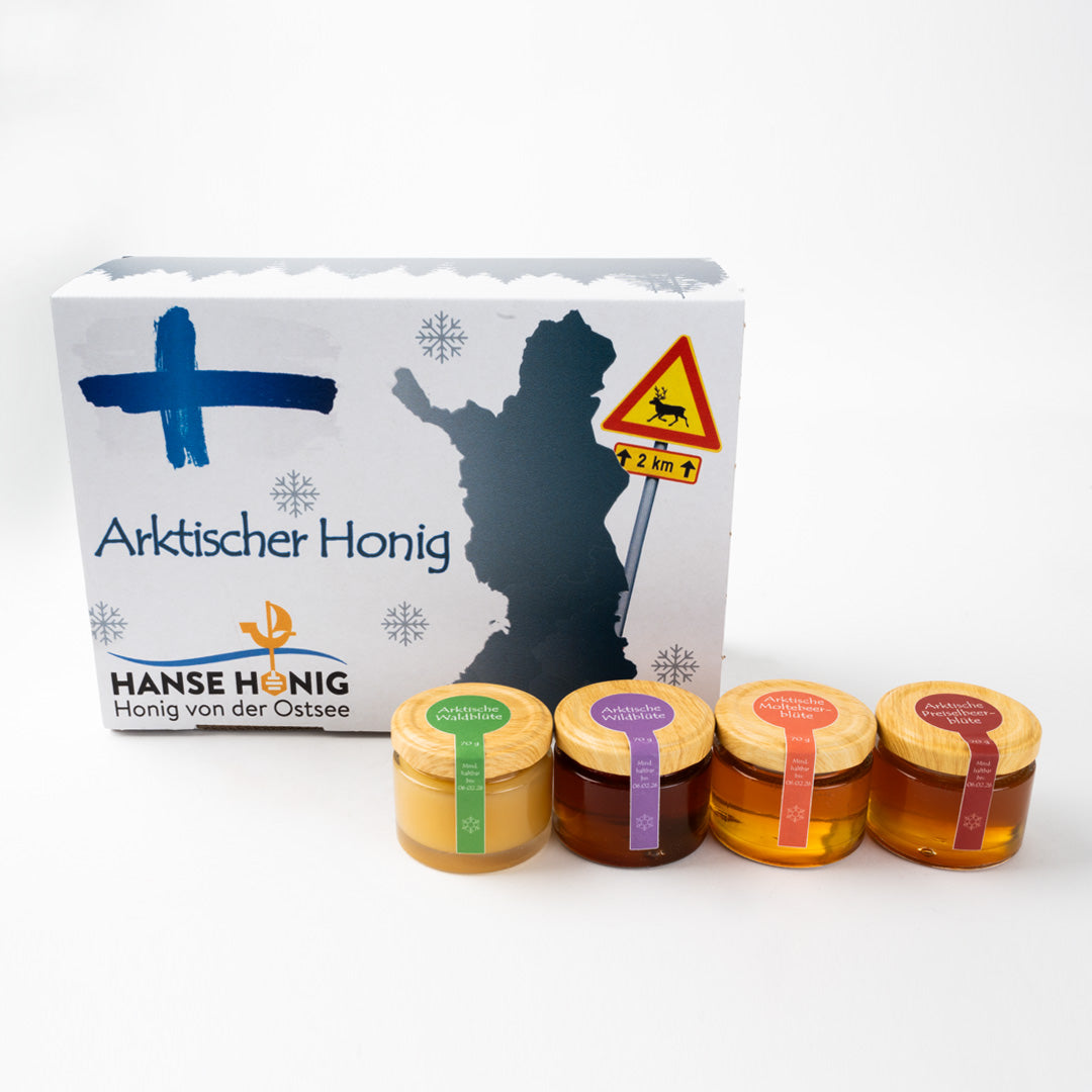 Arktischer Honig Set mit 4 verschiedenen Honigsorten und Verpackung.