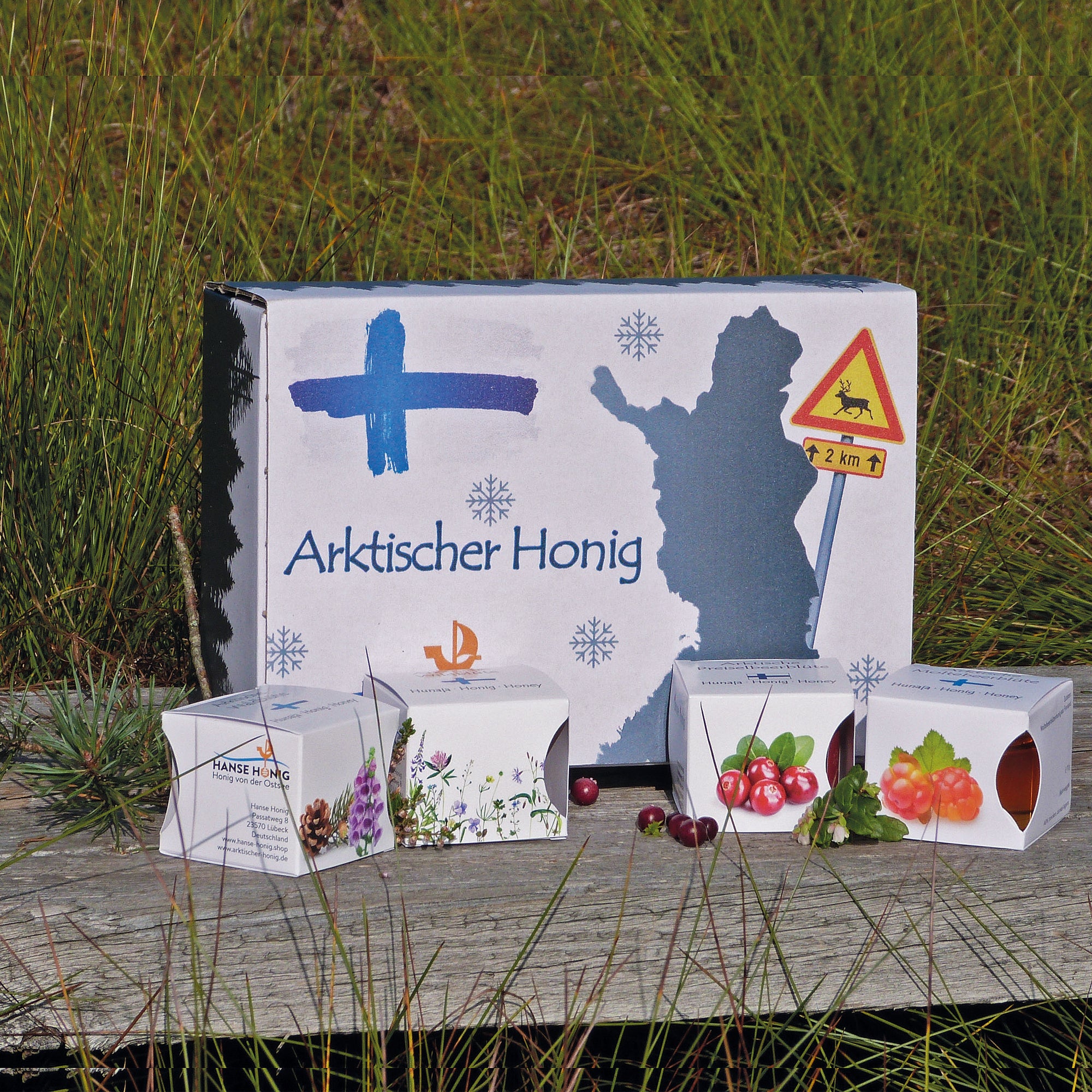 Lot de 4 miels arctiques dans un élégant design nordique en carton.