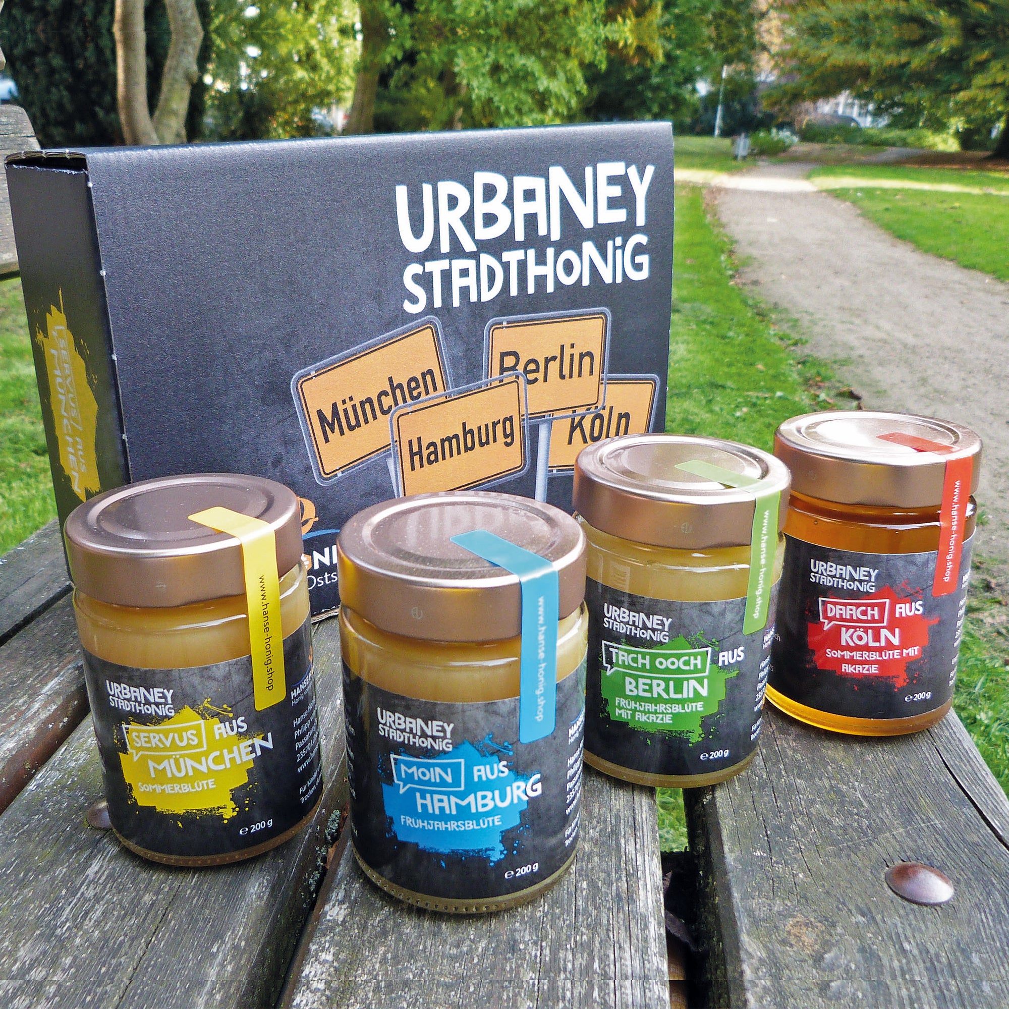 Lot de 4 miels de ville Urbaney dans une élégante boîte à miel de ville.