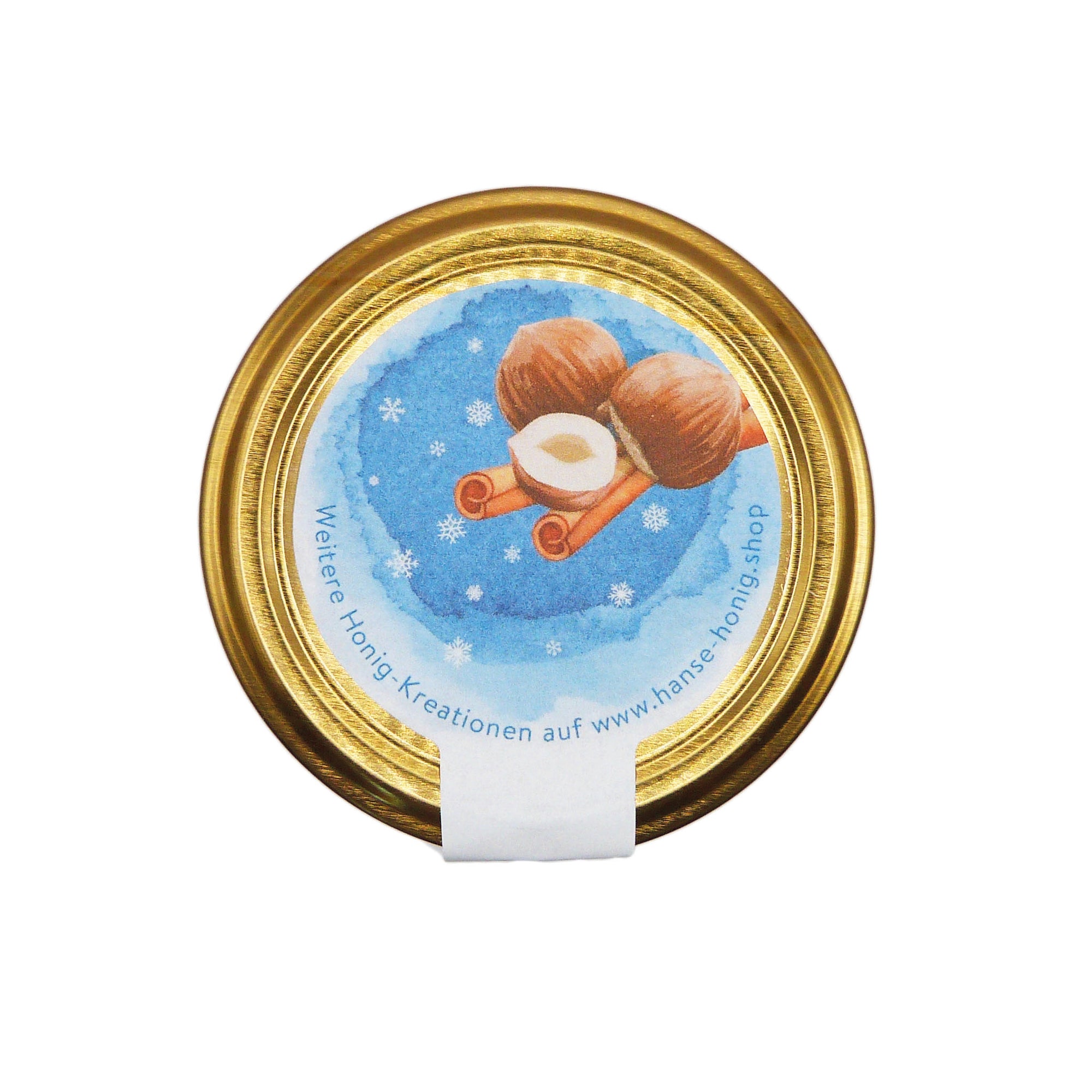 Glas Hanse Honig Winternougat, von oben fotografiert – Blütenhonig mit Haselnussmus und Ceylon-Zimt, cremig gerührt, 250 g, handgemachte Winteredition.